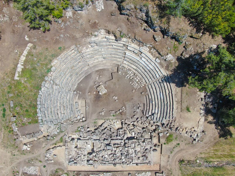 Woman's hand touches the historical excavations